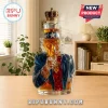 Uncle Sam glass decanter featuring red, white, and blue detailing with a gold-colored crown bottle stopper.!