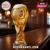 USMNT 113th anniversary beer glass featuring a gold soccer trophy design and USA crest on a wooden bar counter.!