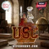 USC glass whiskey decanter featuring a Trojan warrior on horseback with Fight On! and EST. 1880 text on a wooden desk.!