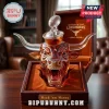 University of Texas Longhorns glass bull whiskey decanter with a football-shaped stopper inside a wooden display case.!