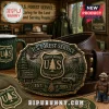 US Forest Service brass belt buckle featuring a tree, lookout tower, truck, eagle, and Smokey Bear figurine on a desk.!