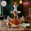 US Navy 250th anniversary anchor-shaped glass whiskey decanter with crystal stopper and etched text on a wooden table.!