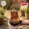 USA 250th anniversary glass whiskey decanter shaped like a bell with an eagle emblem on a dark wooden base.!