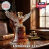Liberty Bell shaped glass whiskey decanter with an eagle stopper, engraved with 1776-2026 text on a wooden office desk.!
