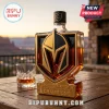 Vegas Golden Knights 2026 Western Conference Champions glass whiskey decanter with gold logo on a wooden table.!