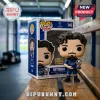 Funko Pop Football Vitinha figure number 145 in Paris Saint-Germain kit holding a silver trophy on a wooden bench.!