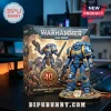 Warhammer 40,000 Ultramarine Space Marine collectible figure with display box on a desk with a gaming keyboard.!