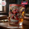 Warhammer 40,000 40th anniversary whiskey glass featuring a 3D Blood Angel space marine and gothic skull embossments.!