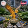 Solar-powered eagle garden statue with gold illumination and blue and gold bandana, mounted on a rock base with 40th anniversary text.!