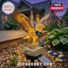 Illuminated eagle garden solar stake with a blue and yellow bandana on a rock base reading Eagles 40th Anniversary 1986-2026.!