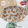 Oval serving tray with orange Tigger pattern on purple and white striped background, featuring Disney 100 logo emblem.!
