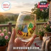 Wizard of Oz 87th anniversary stemless wine glass featuring Dorothy, Toto, and the Emerald City on a yellow brick road.!