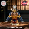 Wolverine X-Men crystal whiskey decanter with yellow and blue faceted glass body and silver metal claws on wooden surface.!