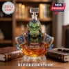 Faceted crystal orc bust whiskey decanter with Horde symbol, 2004-2026 engraving, and hammer topper on a wooden desk.!