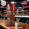 Red glass tumbler with embossed brass-tone The Rock logo, bull emblem, wrestling boots, and microphone iconography.!