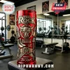 Red tumbler featuring The Rock, Brahma Bull logo, WWE championship belt, and wrestling boot reliefs in metallic gold.!