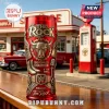 The Rock themed red tumbler with embossed gold bull logo, WWE championship belt, and wrestling boot graphics on bar top.!