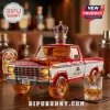 Amber glass 1979 Ford F-150 truck bottle featuring a Crown Royal cap and branding on a wooden bar counter.!