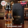 Slash figurine-shaped glass whiskey decanter with a black top hat, next to a black Guns N' Roses presentation box.!