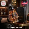 Slash Guns N' Roses shaped glass whiskey decanter held in hand next to a branded black presentation box.!