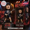 Angus Young AC/DC bobblehead figure with black schoolboy suit and Gibson SG guitar on a round pedestal in collector box.!