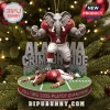 Alabama Crimson Tide 2025 Playoff Mascot Christmas ornament featuring Big Al standing over a mascot on a football field base.