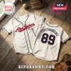 White baseball jersey with navy blue trim, featuring Alan Jackson name on front and Chattahoochee 89 text on the back.!