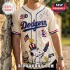 Cream baseball jersey with Los Angeles Dodgers script, Snoopy holding a firework, fireworks graphics, and US flag motifs.!