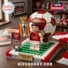 Arsenal FC brick minifigure holding a trophy on a green field base with a soccer ball and 2025-26 champions plaque.!