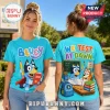 Blue cyan crew-neck t-shirt featuring Bluey holding a pencil and test notebook on the front and classroom scene on back.!