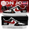 Custom Bon Jovi branded sneakers in black, white, and red with band member signatures and heart dagger logo on side panel.!