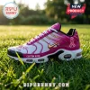 Custom pink and white athletic sneaker with gold swoosh, breast cancer awareness ribbon, and text in grass field.!
