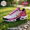 Custom breast cancer awareness sneaker in white, pink, and gold featuring a ribbon icon and custom name text on grass.!