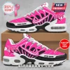 Custom pink breast cancer awareness athletic sneakers with Hope text, ribbon graphics, and white soles on a cardboard box.!