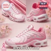 Pink breast cancer awareness athletic sneakers with silver accents, ribbon motifs, and faith-hope-love text on side soles.!
