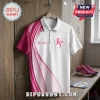 Custom white polo shirt with pink breast cancer awareness ribbon, halftone patterns, and customizable name placeholder.!