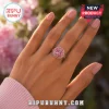 Rose gold ring featuring a round pink stone with a breast cancer awareness ribbon and the word Hope engraved.!