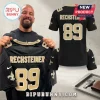 Man holding a black and gold custom jersey featuring the name Rechsteiner and number 89 with fleur-de-lis sleeve logos.!