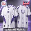 BTS Beyond The Stage 2026 Purple White Jersey featuring v-neck design, front and back graphics, and member names.