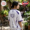 BTS Beyond The Stage 2026 Purple White Jersey worn by a woman featuring member names, tour text, and geometric graphics.