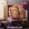 BTS BT21 Limited Edition Gold Metal Lighter Case featuring embossed Cosmic Friends characters in a purple velvet gift box.
