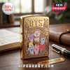 BTS BT21 Limited Edition Gold Metal Lighter Case featuring engraved Cosmic Friends characters on a polished gold surface.