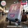 BTS BT21 Pastel Pink Luggage Cover featuring BTS logo, BT21 characters, and I'll wait for you text in an airport terminal.