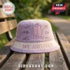 BTS Corduroy Embroidered Bucket Hat in light purple with official group logo and member signatures on a park bench.