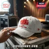 BTS Distressed Baseball Cap in light denim fabric with red embroidered band logo and world tour text on a stage crate.