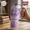 BTS Love Yourself purple handle tumbler featuring a 3D embossed logo, galactic star patterns, and text on a light background.