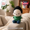 BTS Min Yoongi Grumpy Face Plush Doll wearing a green striped shirt and blue jeans, sitting on a textured beige sofa.
