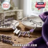 BTS Purple I Purple You Charm Bracelet with microphone and heart beads on a silver snake chain over wooden surface.