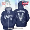 BTS Taehyung Los Angeles Dodgers pullover hoodie with navy blue fabric, white Dodgers script, and V lettering on back.