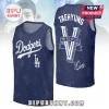 BTS Taehyung Los Angeles Dodgers sleeveless jersey featuring blue fabric, white text, team logos, and signature graphics.